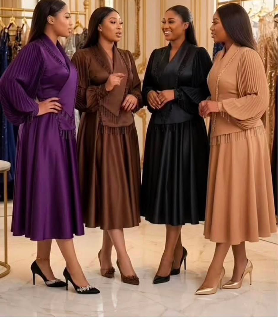 Robe midi satin plissé à frange